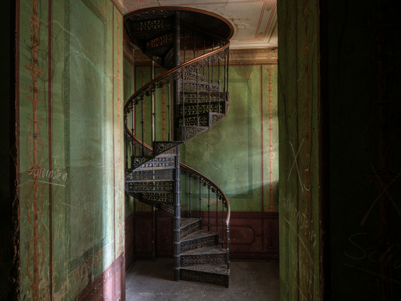 A dark iron spiral staircase