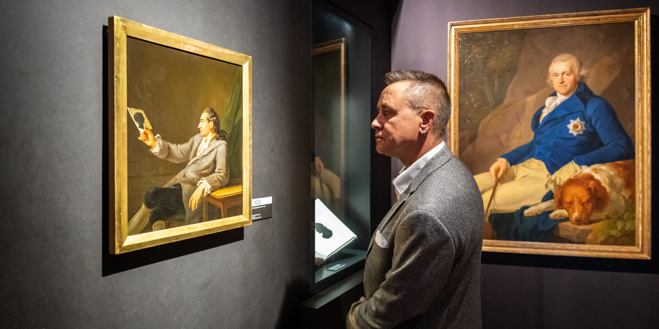 A Visitor viewing a portrait of Goethe